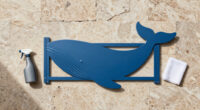 blue aluminum panels curve to shape a whale-like entrance gate by wutopia lab